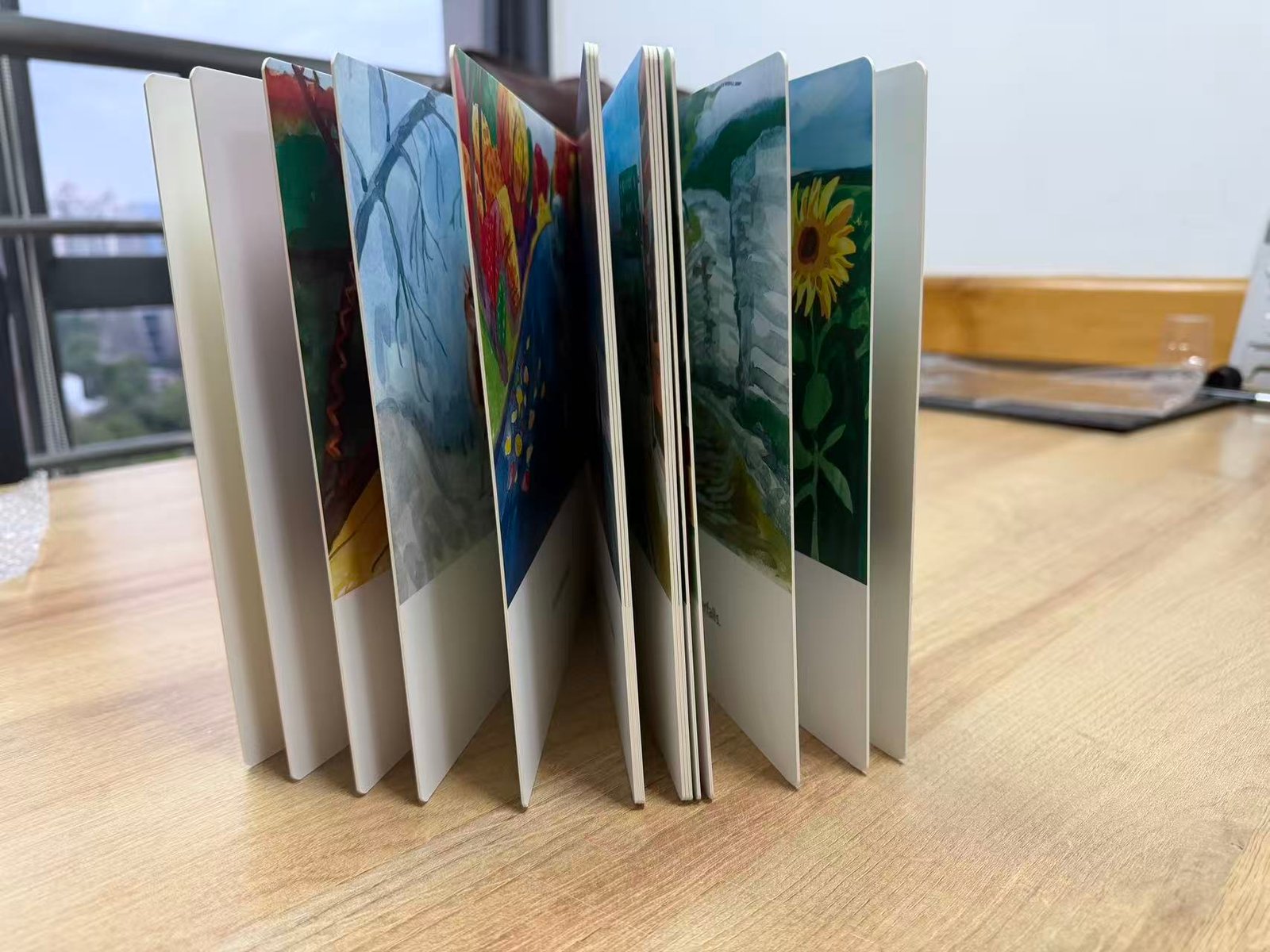 The ABCs of New Paltz hardcover opened to show its illustrated pages and page block
