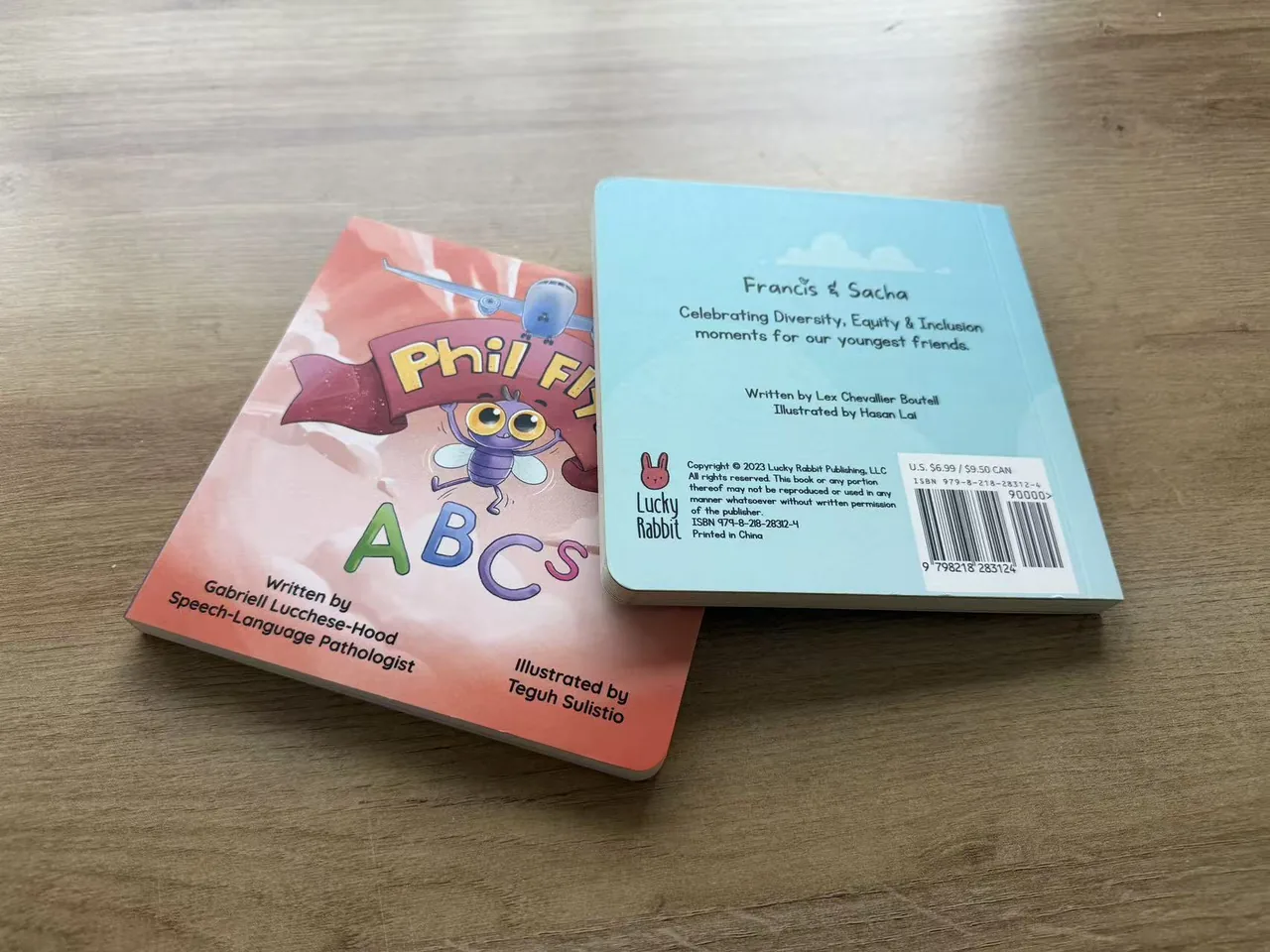 Two completed rounded-corner children's books